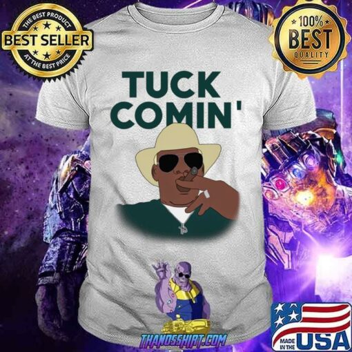tuck comin t shirt